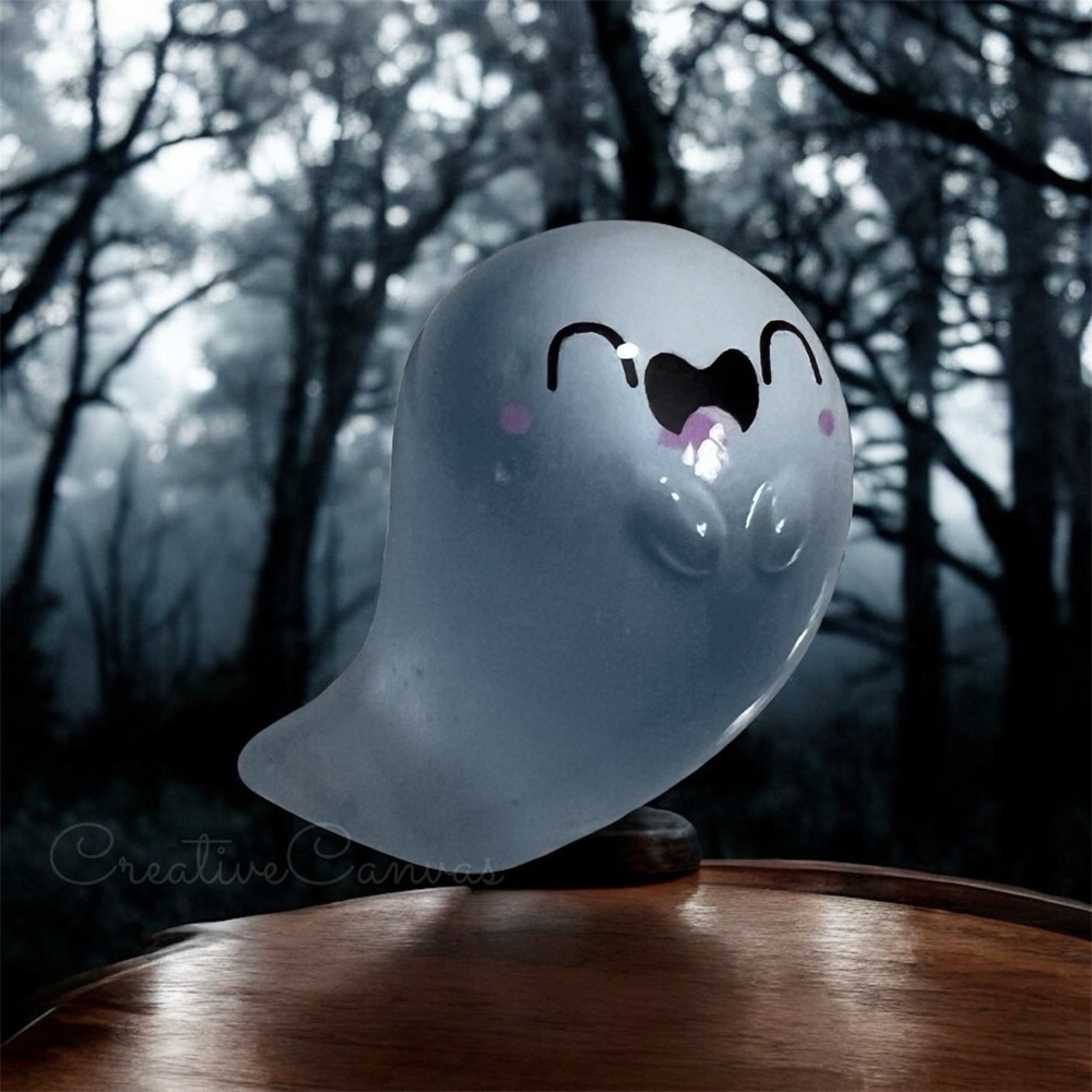 Joyful Light Blue Glow In The Dark Ghost Figurine